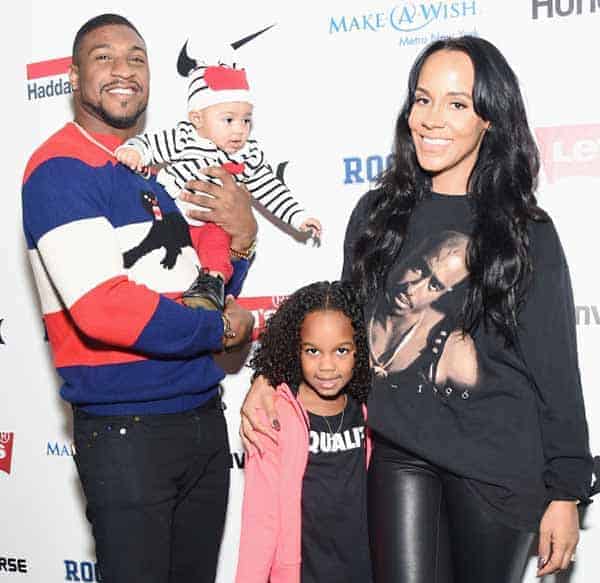 Dashon Goldson and Ashley North seen with their two daughters in USA fashion show