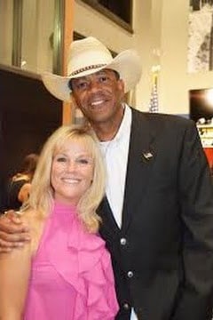 Julie Clark with her husband David Clarke who is wearing a white hate