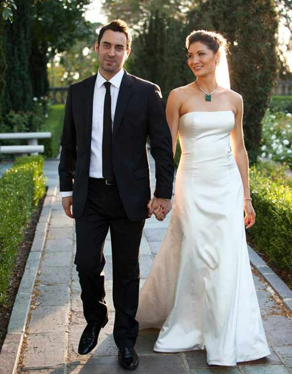 Liberte Chan and her boyfriend Brian Chase in a white wedding dress