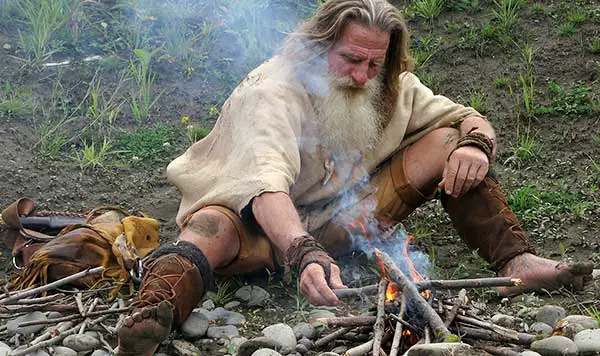 Mick Dodge making his food ready, searching in the mountain