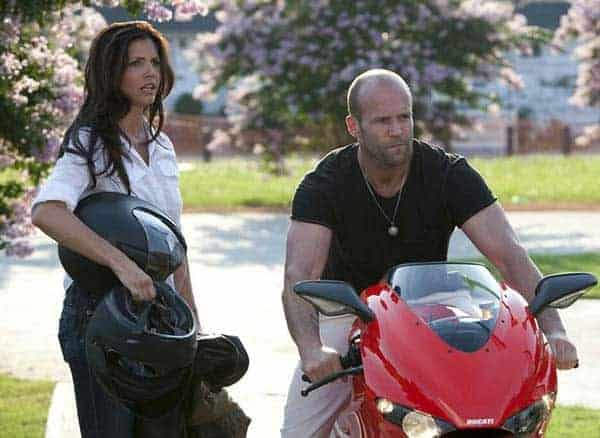 Charisma Carpenter and Jason Statham in The Expendables movie scene