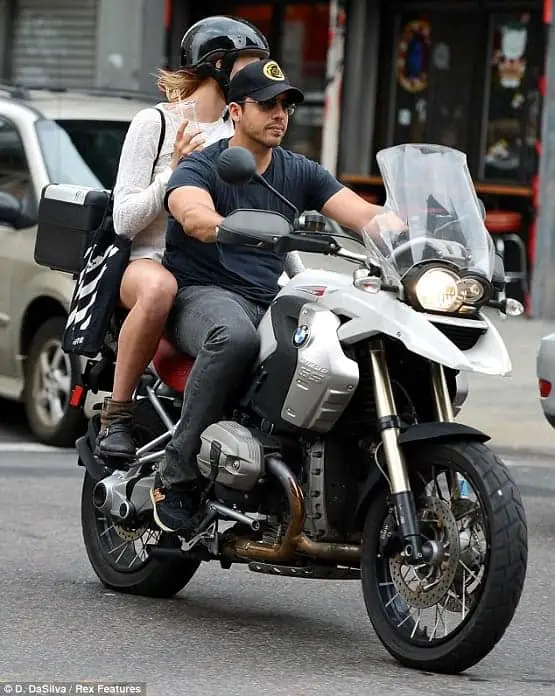 David Blaine on a BMW bike with his fiance Alizee Guinochet
