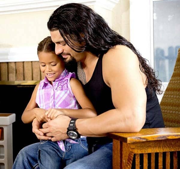 Professional Wrestler Roman Reigns with his daughter