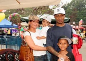 Image of Angie Martinez with husband and kids