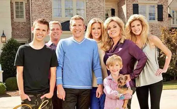 Image of Julie Chrisley with her husband and kids