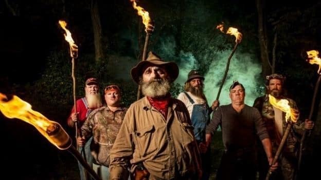 A still from Mountain Monsters. John Tice in the center.
