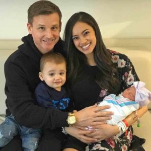 Image of Briyana Noelle Flores with her husband and kids