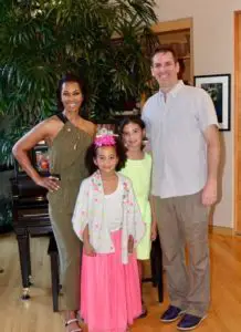 Image of Harris Faulkner with her husband and children