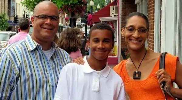 Image of Carla Hall with her husband Mathew Lyons and son Noah Lyons