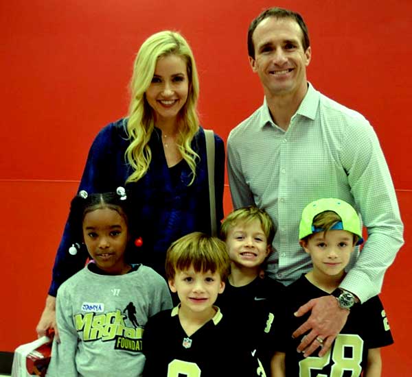 Image of Brittany Brees with her husband Drew Brees and their kids