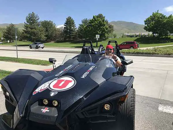 Image of Kyle Whittingham with his car