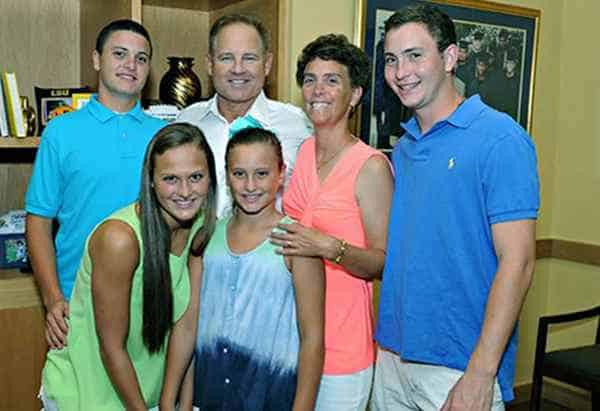 Image of Les Miles with his wife Kathy Miles and kids