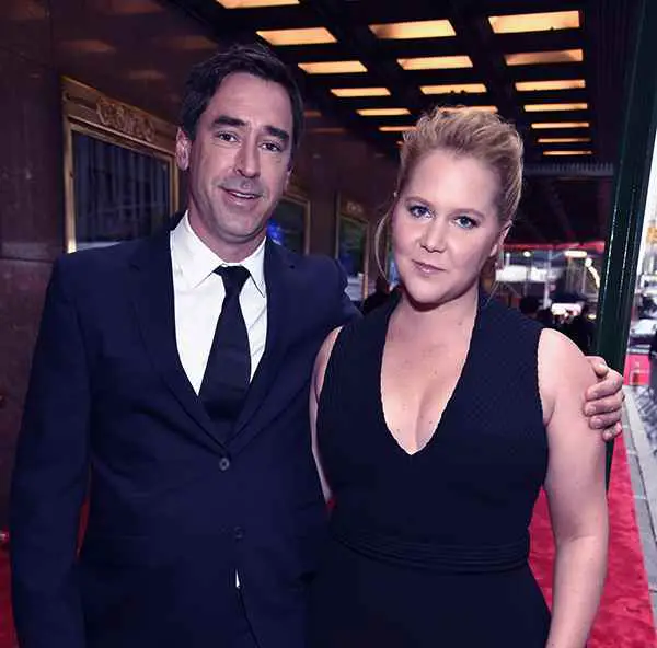 Image of Amy Schumer with her husband Chris Fischer