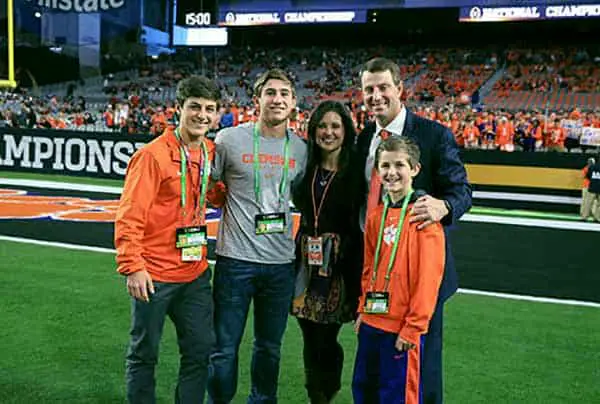 Image of Dabo Swinney with his wife Kathleen Swinney and with their kids