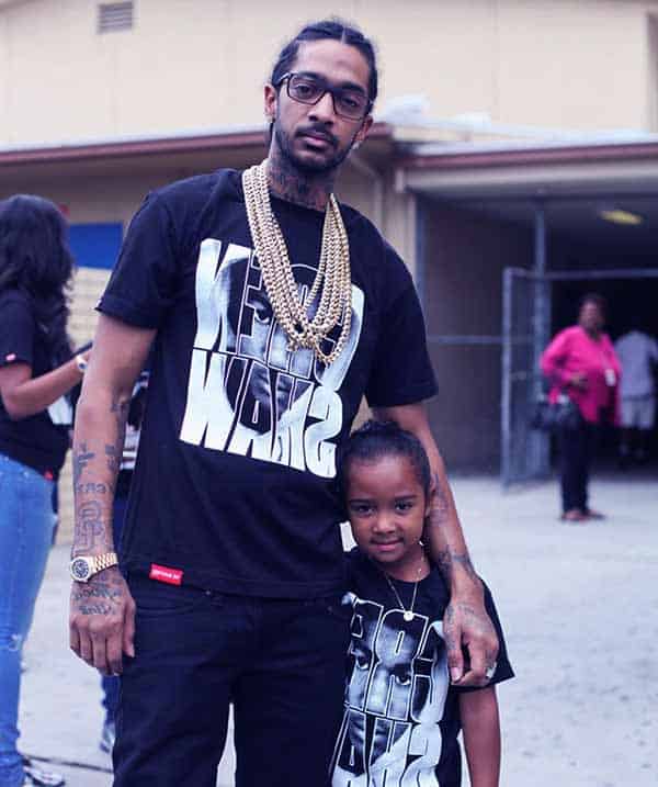 Image of Nipsey Hussle with his daughter Emani Asghedom