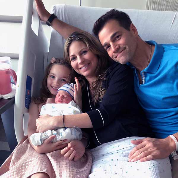Image of Rob Marciano with his wife Eryn Marciano and with their kids
