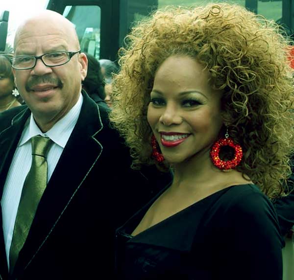 Image of Tom Joyner with his second wife Donna Richardson