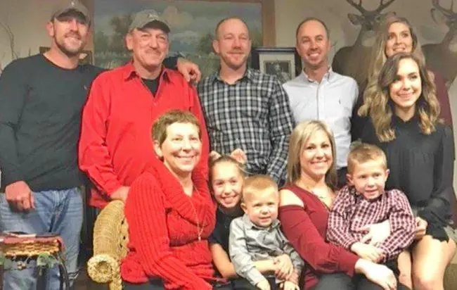 Troy Landry with his family, wife and sons