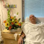 Image of Troy Landry on hospital bed after Prostate Surgery