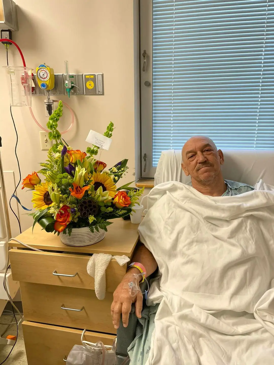 Image of Troy Landry on hospital bed after Prostate Surgery