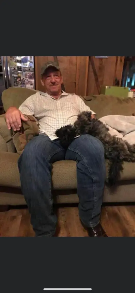 Image of Troy Landry with his dog