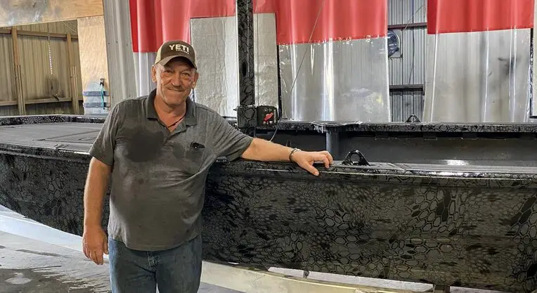 Image of Troy Landry with his Boat