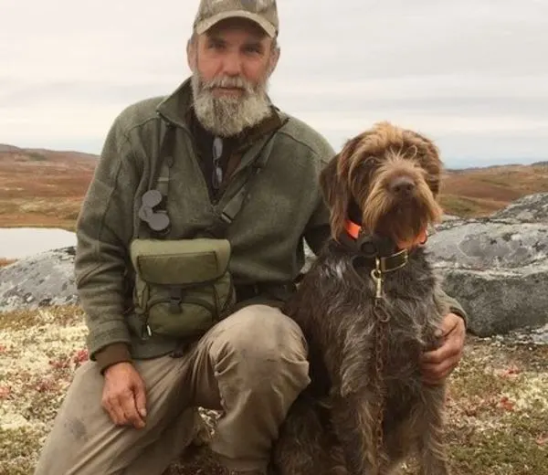 Image of Mike Horstman with his Dog