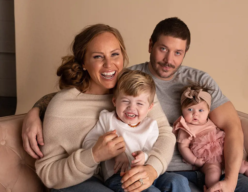 Image of Mina Starsiak with her husband Steve Hawk and kids