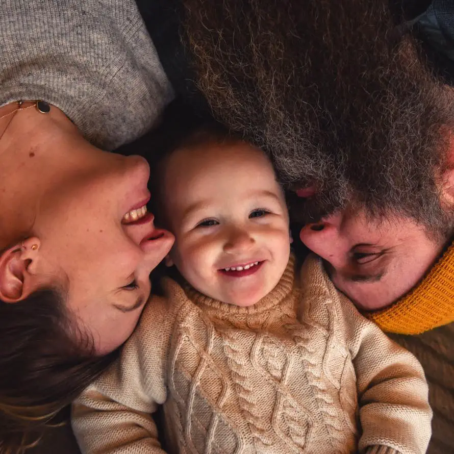 Image of Katie Raney with her husband Matt Raney and kid