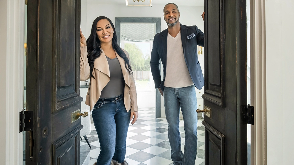 Picture of Egypt sherrod and mike Jackson working on home renovation