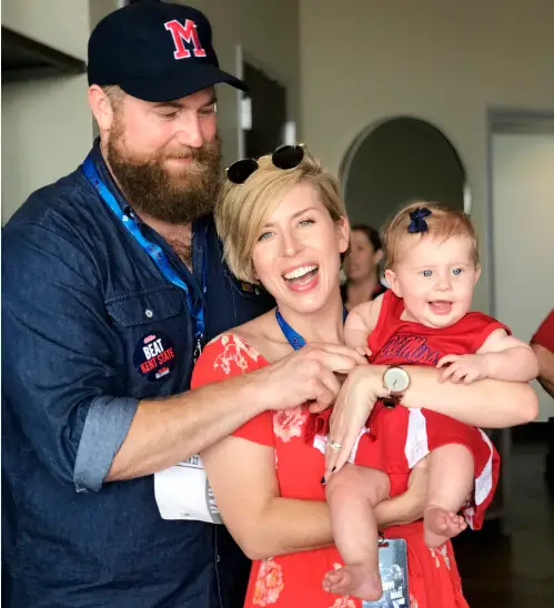 Image of Ben Napier and Erin Napier with their daughter Mae