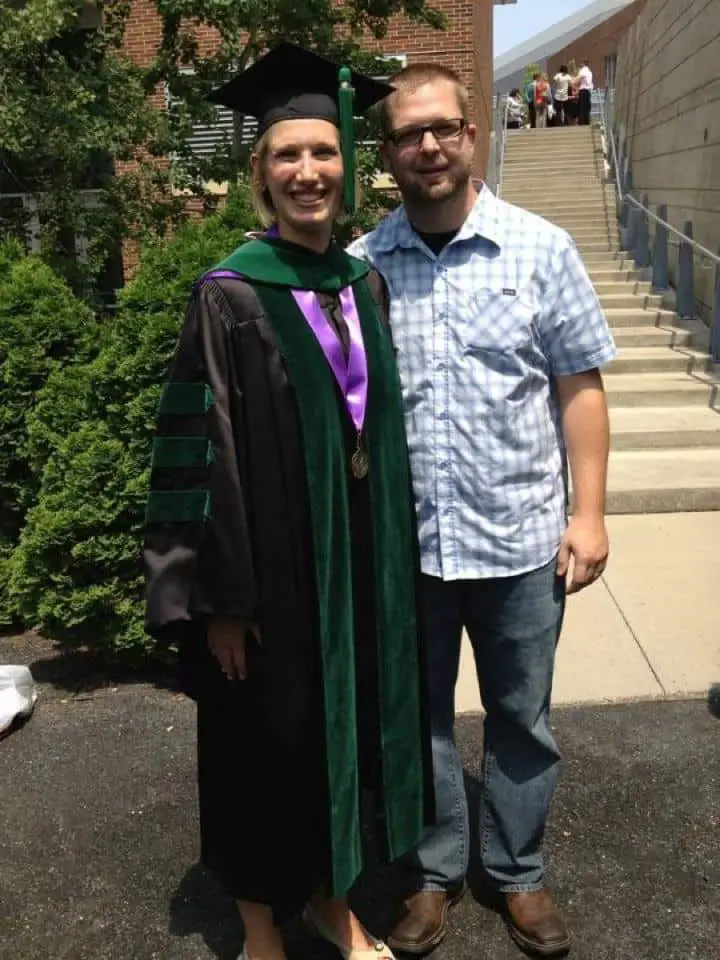 Image of Phil Cato with his wife, Shana Godfred-Cato, on her graduation