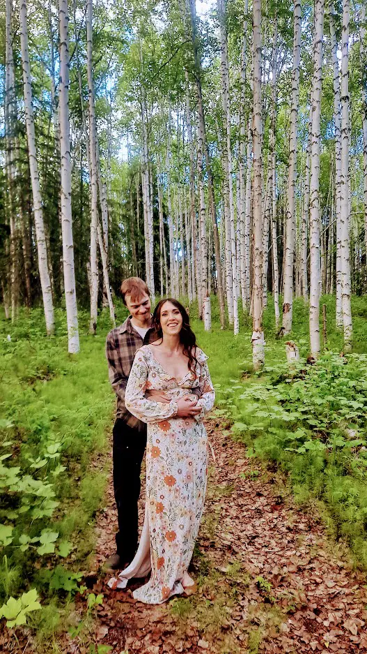 Wedding image of the Last Alaskans cast Charlie Jagow and his wife Mercy Hampton with their dog