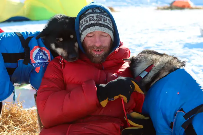 Image of jessie Holmes with his dogs