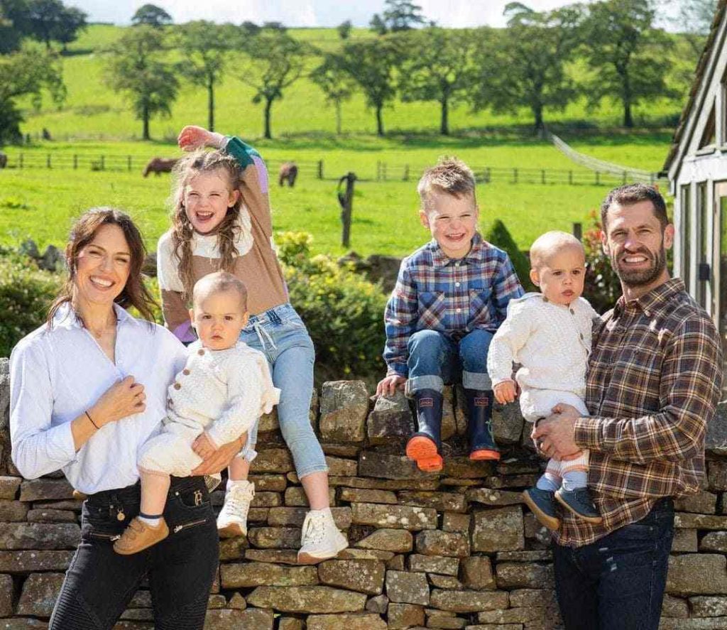 Image of Kelvin Fletcher with his wife and four children